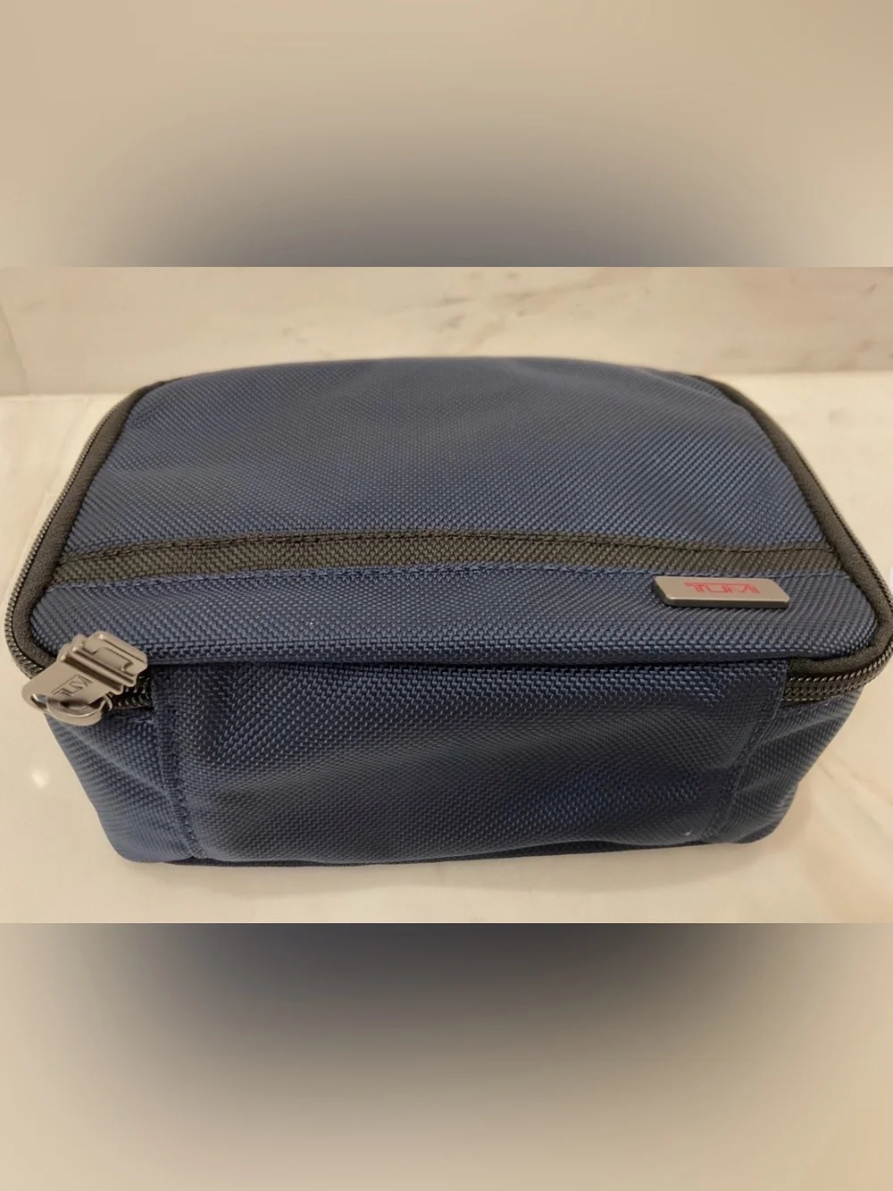 Tumi up sale
